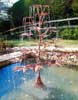 copper maple fountain in a koi pool