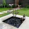 copper hosta water feature in a garden pond- by Gary Pickles of Metallic Garden